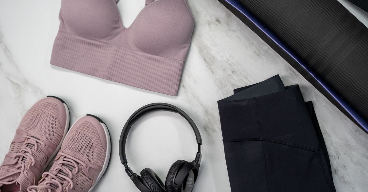 Girls' activewear flat lay: sports bra, leggings and trainers